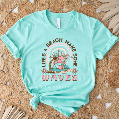 T-shirt unisexe décontracté de Skeleton Life’s A Beach